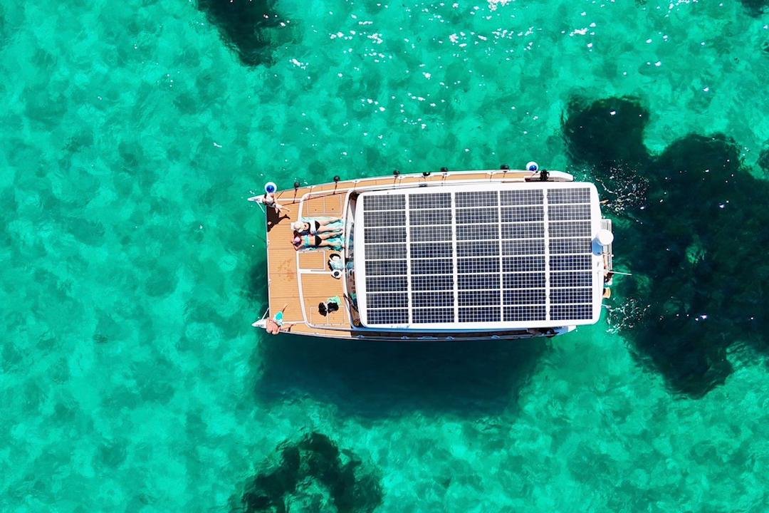 Eco-friendly solar boat tour in Palma Bay Solar-powered boat cruising in Palma Bay