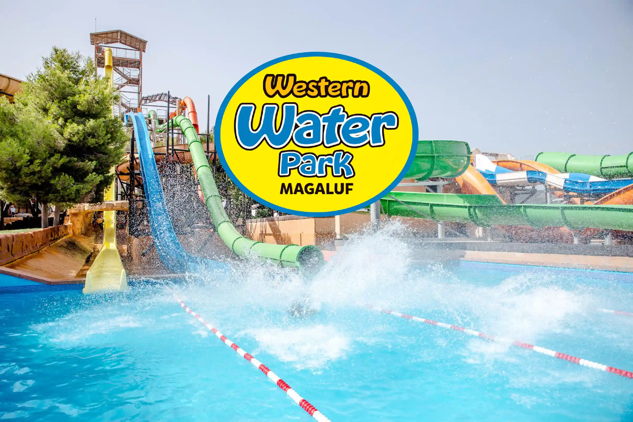 The logo of Western Water Park Magaluf over a view of water slides splashing into a big swimming pool.